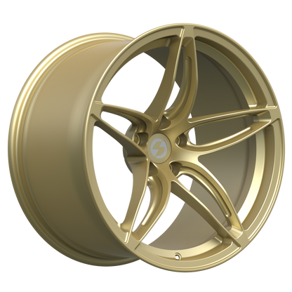 Strato Dynamics F5S forged monoblock wheel in Grand-Prix Champagne shown in 3/4 view highlighting elegant metallic tone and concave motorsport design.
